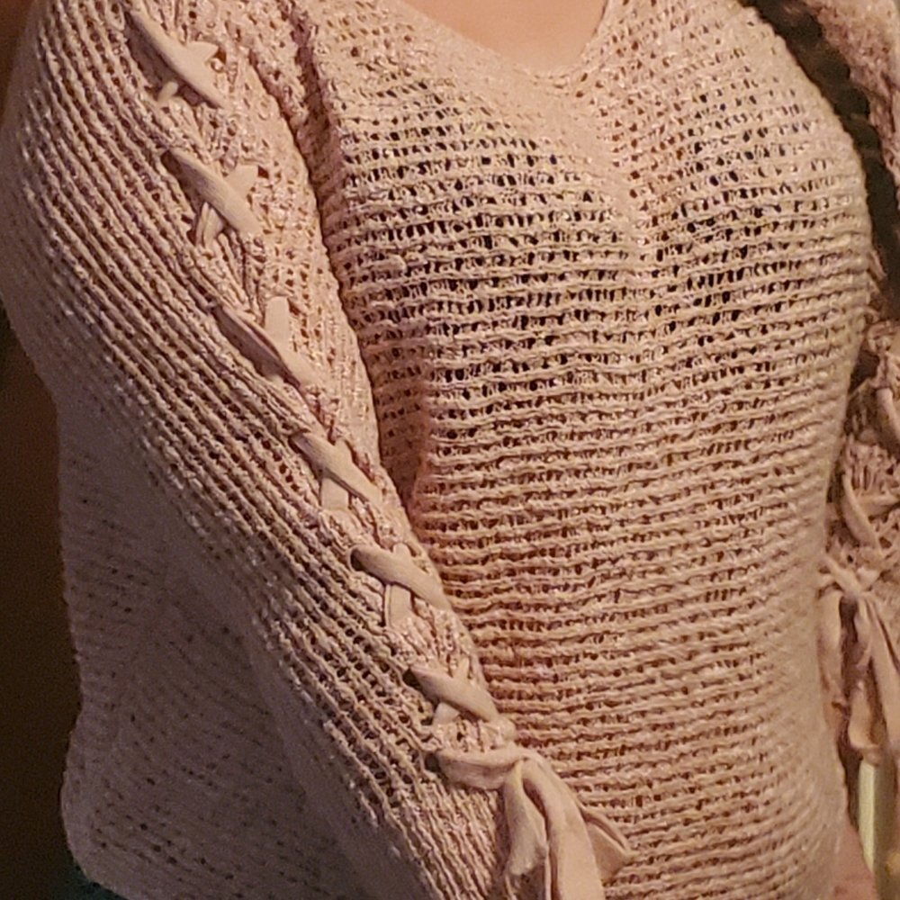 Pink knit lace up sleeve sweater